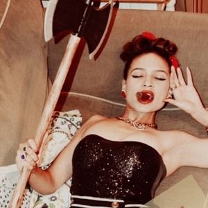 Black lace and sequin bustier corset top.